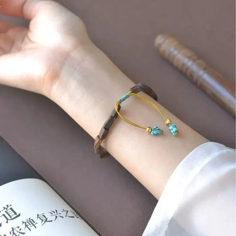 Bracelet élégant pour couple en bois d'agar de Brunei et pierre de Bouddha