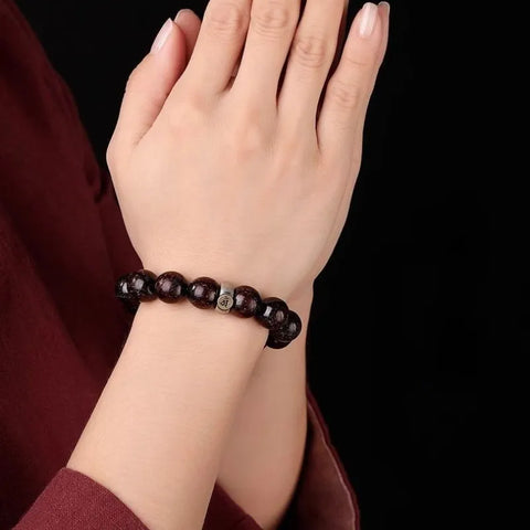 Armband mit buddhistischen Perlen aus indischem Rosenholz