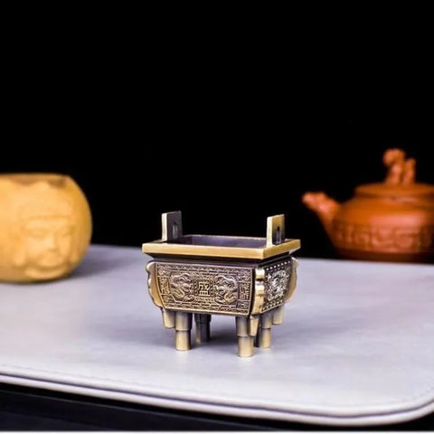 Brûleur d'encens miniature carré à quatre pieds