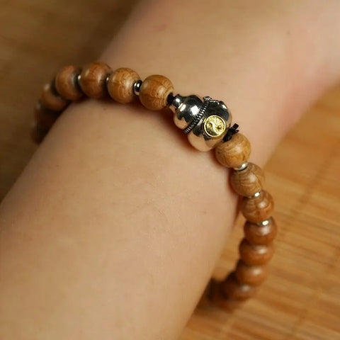 Bracelet de protection et de paix en perles de calebasse en bois à six canaux