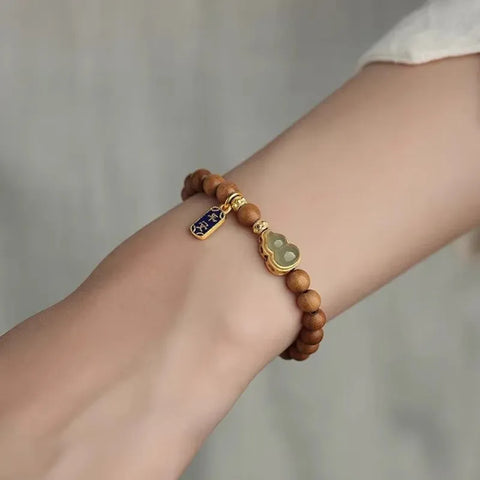 Bracelet Feng Shui taoïste en bois de santal et jade – Pour l'harmonie et la protection